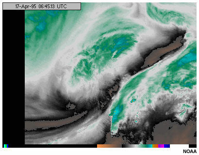 An animation of GOES-8 6.7 micron water vapor channel imagery relative to the motion of a large-scale trough of low pressure
