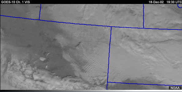 vis image of the Northern Plains with annotations indicating snow cover and low clouds