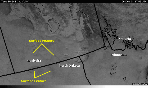 Vis image over Manitoba and the northern U.S. with annotations ssurface features